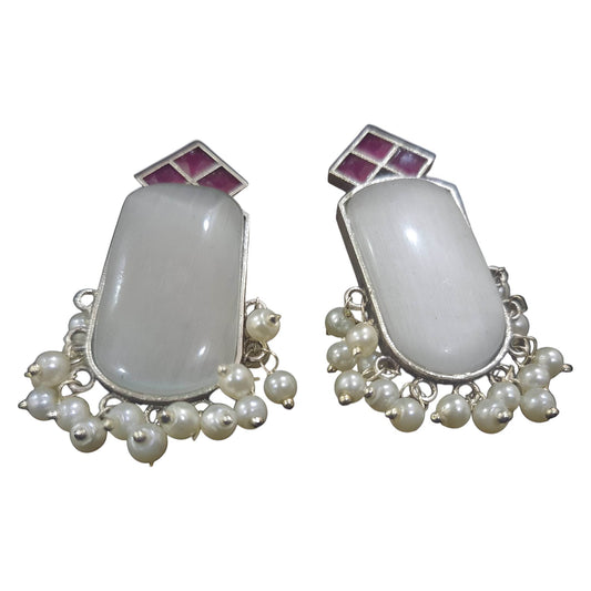 Elegant handcrafted brass drop earrings featuring white stones and pearl embellishments