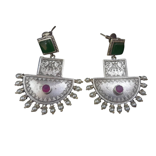 Unique handcrafted brass drop earrings featuring intricate designs and colorful accents