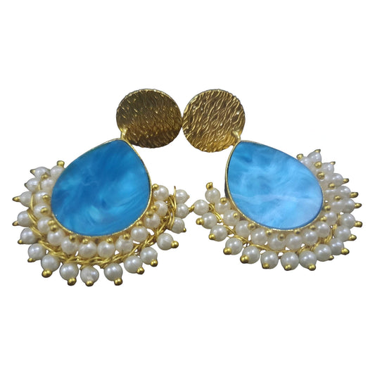 Handcrafted brass drop earrings featuring blue stone and pearl embellishments for elegant style
