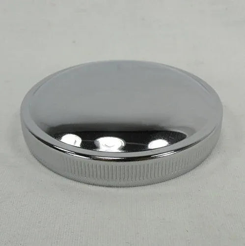 Chrome motorcycle gas tank cap with vented circular top and ridged edge