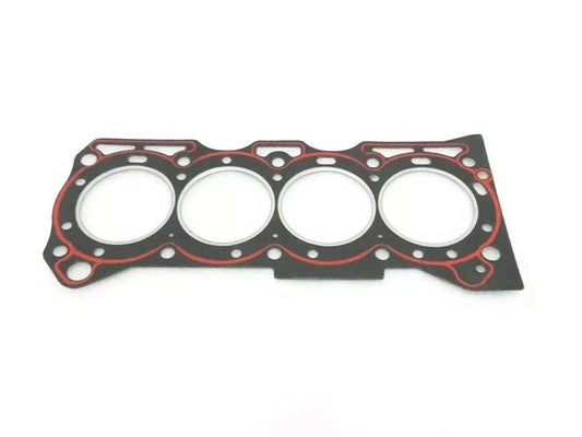 Engine head gasket with four cylinder cutouts, black with red seal rings