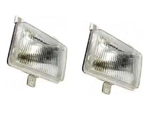 Tractor headlight pair with clear lens and rectangular metal housing