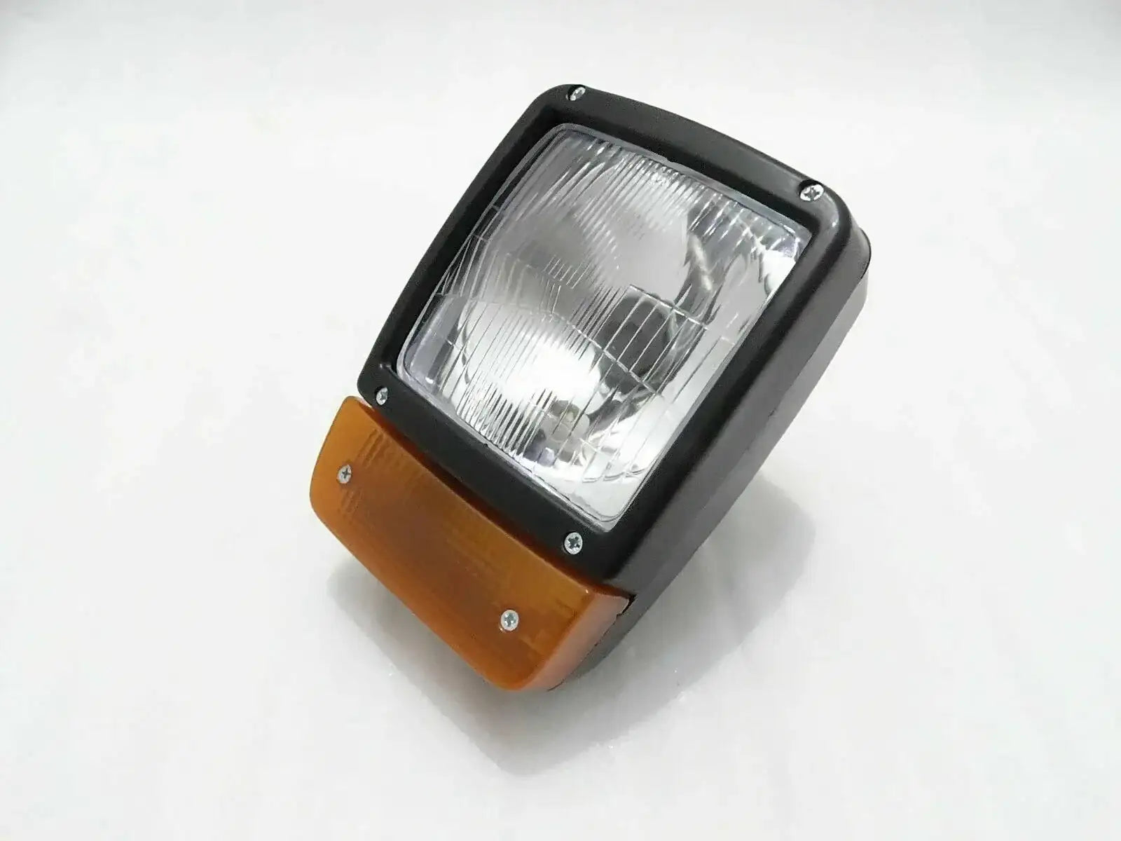 Front headlight and amber indicator assembly with clear H4 lens
