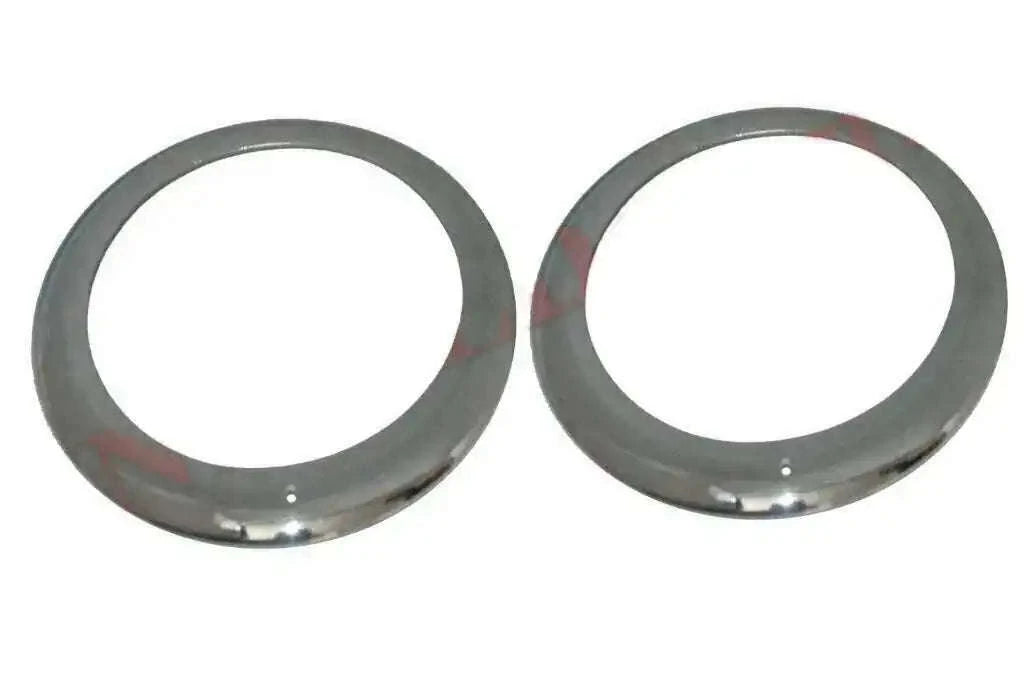 Chrome-plated headlight outer bezel pair, two circular rings with mounting holes