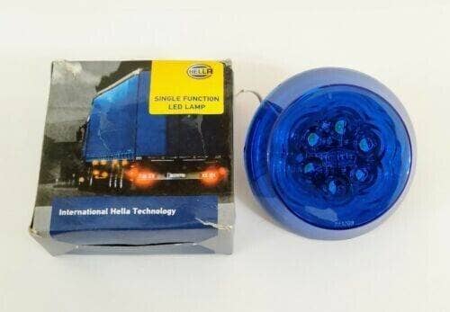 Hella blue 12V LED marking lamp with round design and box packaging