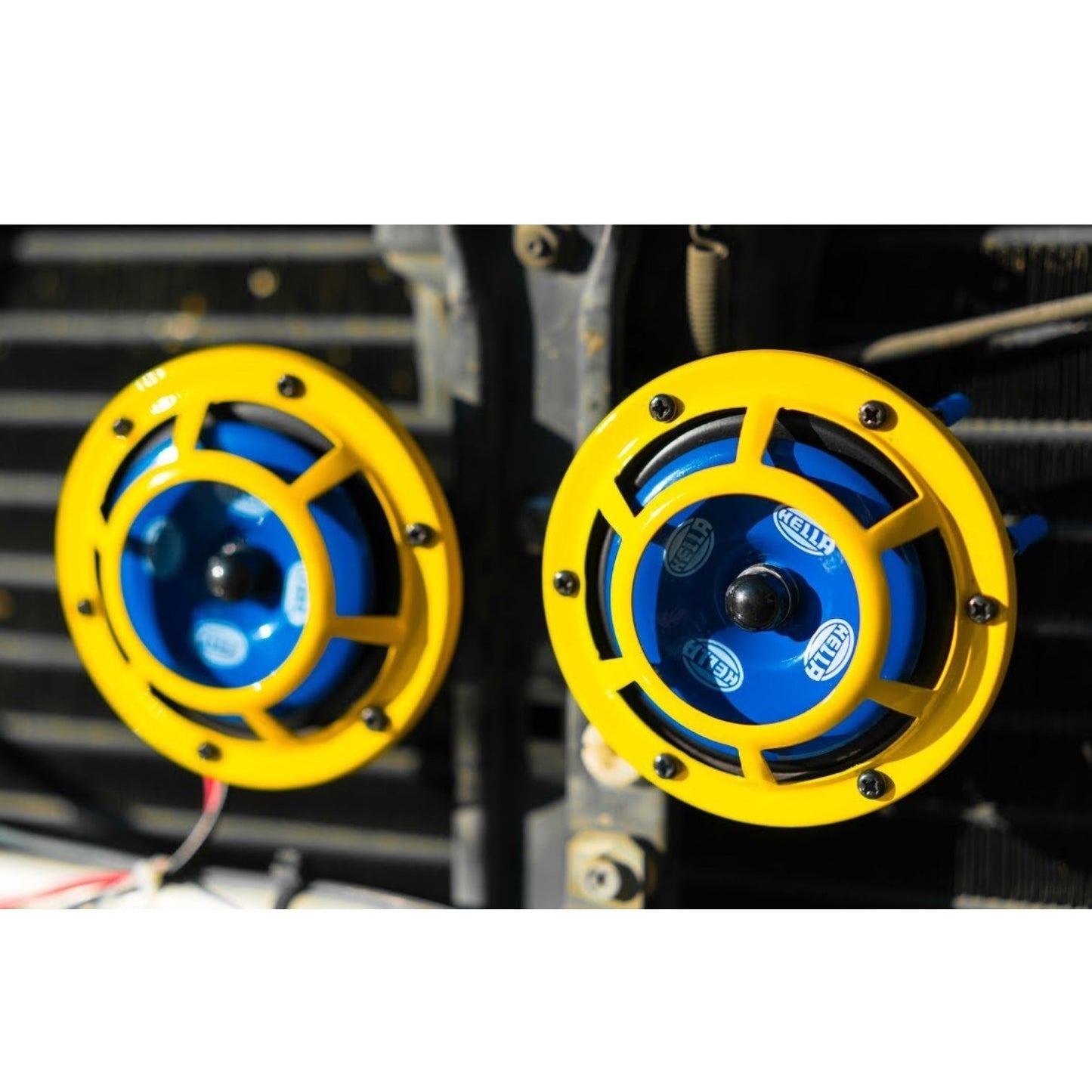 High tone low tone horn kit with yellow housing and blue accents for automotive vehicles
