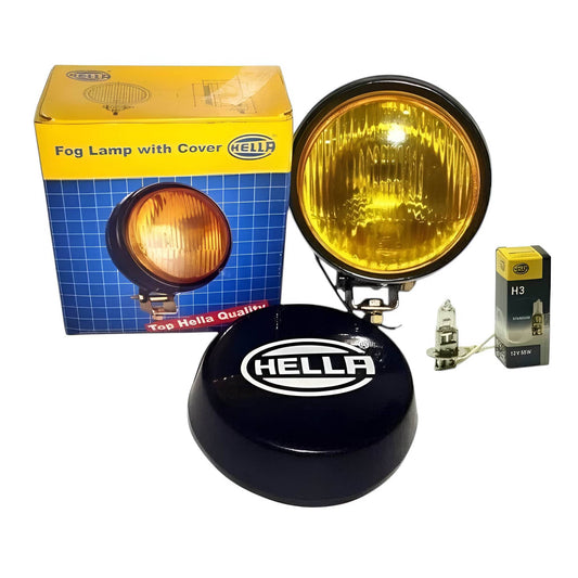 Hella round fog lamp with yellow light and cover, includes H3 bulb, packaged for easy installation