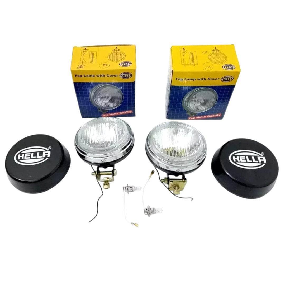 Hella universal fit fog lamp set with black covers for improved visibility in low light conditions