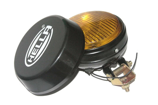 Hella Yellow Fog Lamp with Black Cover, compact design for improved vehicle visibility in foggy conditions