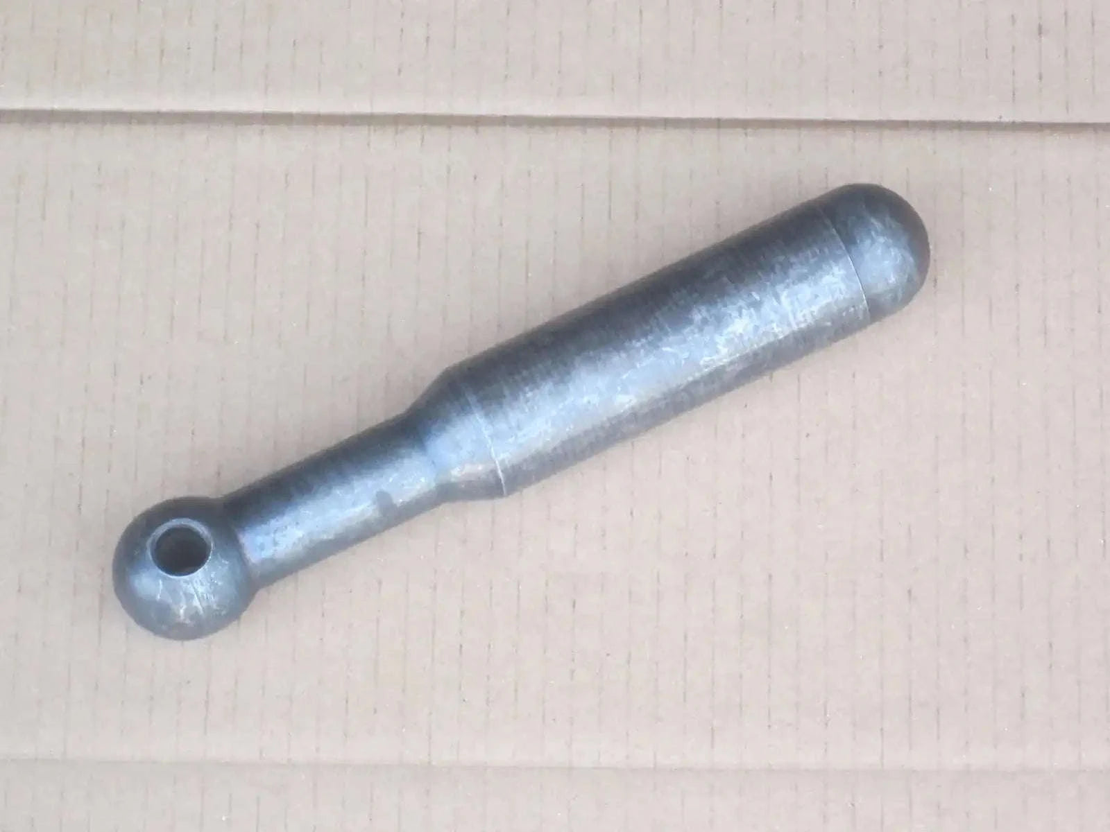 Hydraulic cylinder ram rod with eye end, metal shaft