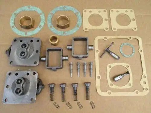 Hydraulic pump major repair kit with valve chamber gaskets, springs, and fittings