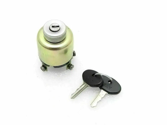 Ignition switch cylinder with two keys, yellow metal housing and black key blanks