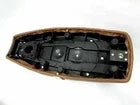Seat pan underside with black mounting hardware and slots