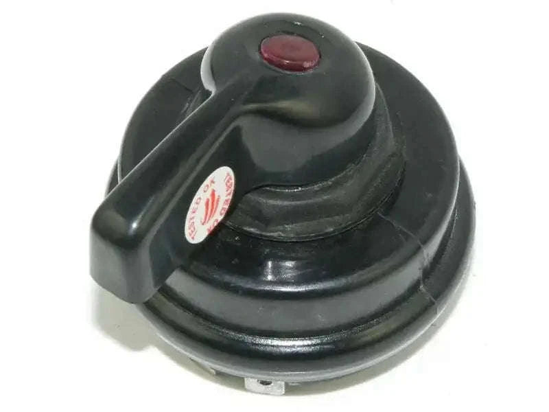 Black turn signal flasher switch with red indicator lens and circular base