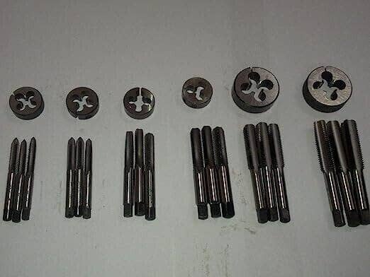 left hand thread tap and die set arranged in orderly rows for industrial use