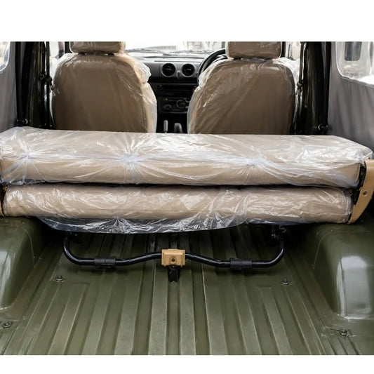 Foldable rear seat bench in beige, designed for infant car seat rear facing use in vehicles