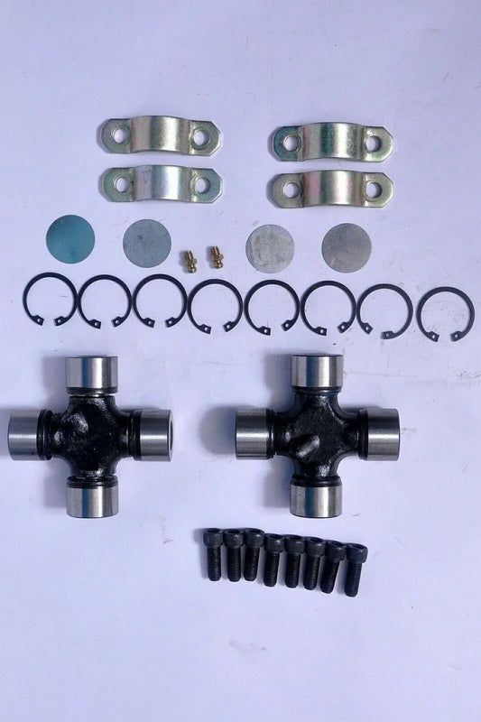 Universal joint kit with two cross assemblies, metal yokes, circlips, bolts and washers