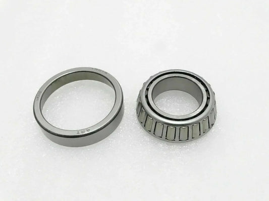 Tapered roller bearing set with inner and outer rings, silver and dark steel