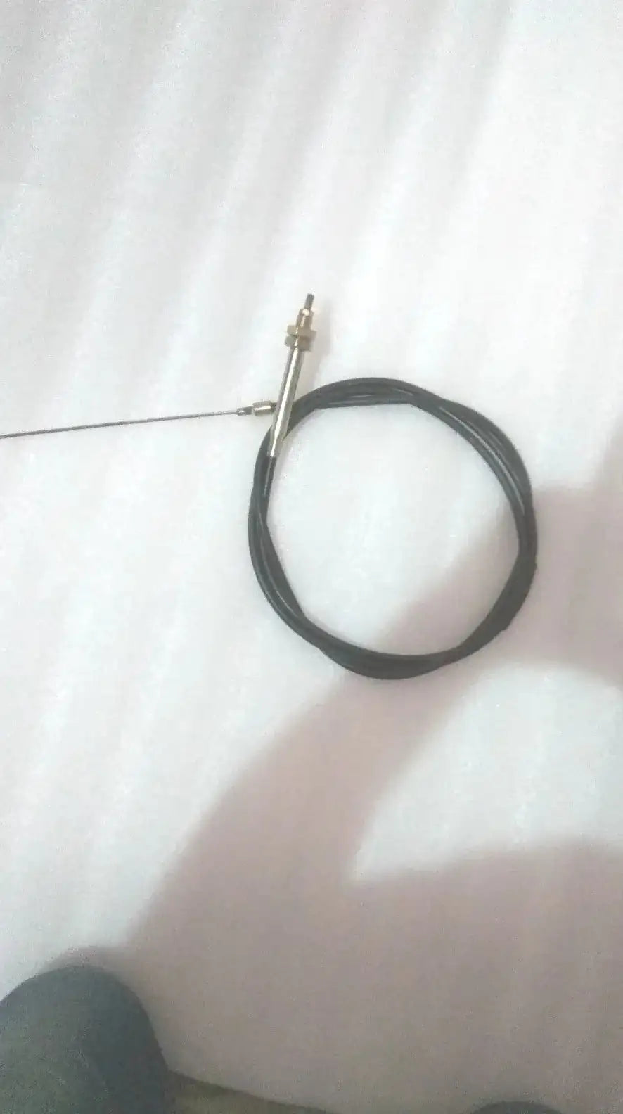 Handbrake cable for JCB 3CX, black cable with metal connector end
