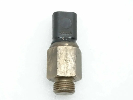 Oil temperature switch with threaded metal body and black sensor tip
