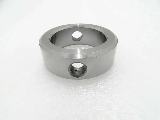 Metal pivot pin boss with two mounting holes, circular housing