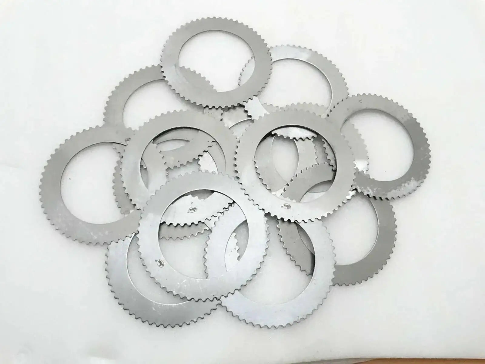 Transmission counter plates set of 14, silver metal gear-like rings