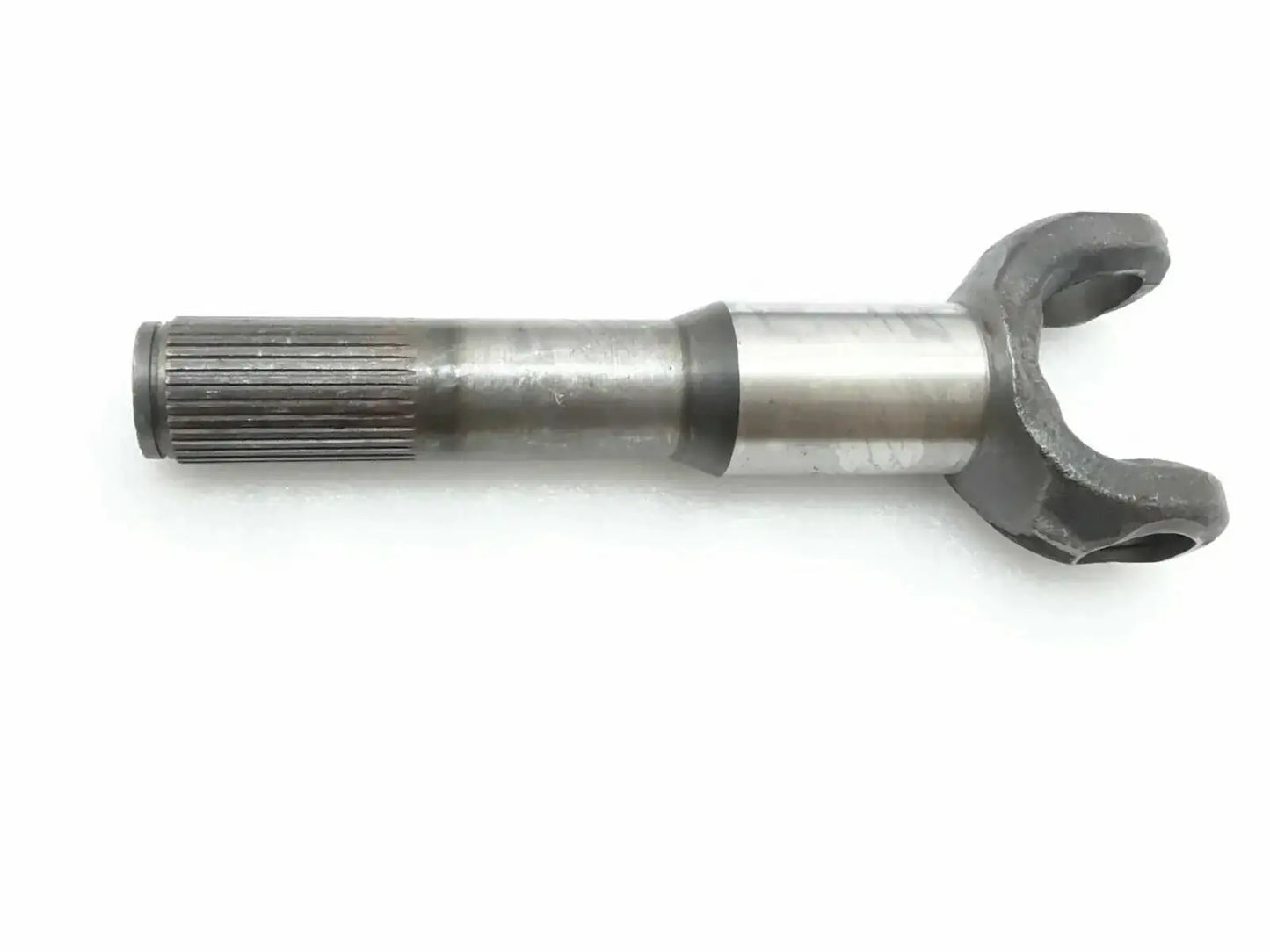 Steel shaft hub side yoke with splined shaft end and forked connector