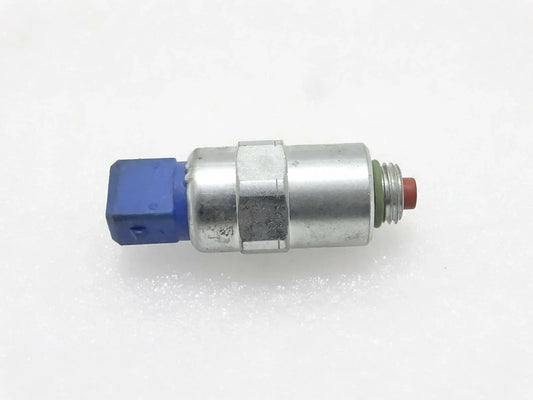 Solenoid fuel pump with metal body, blue connector, and red terminal tip