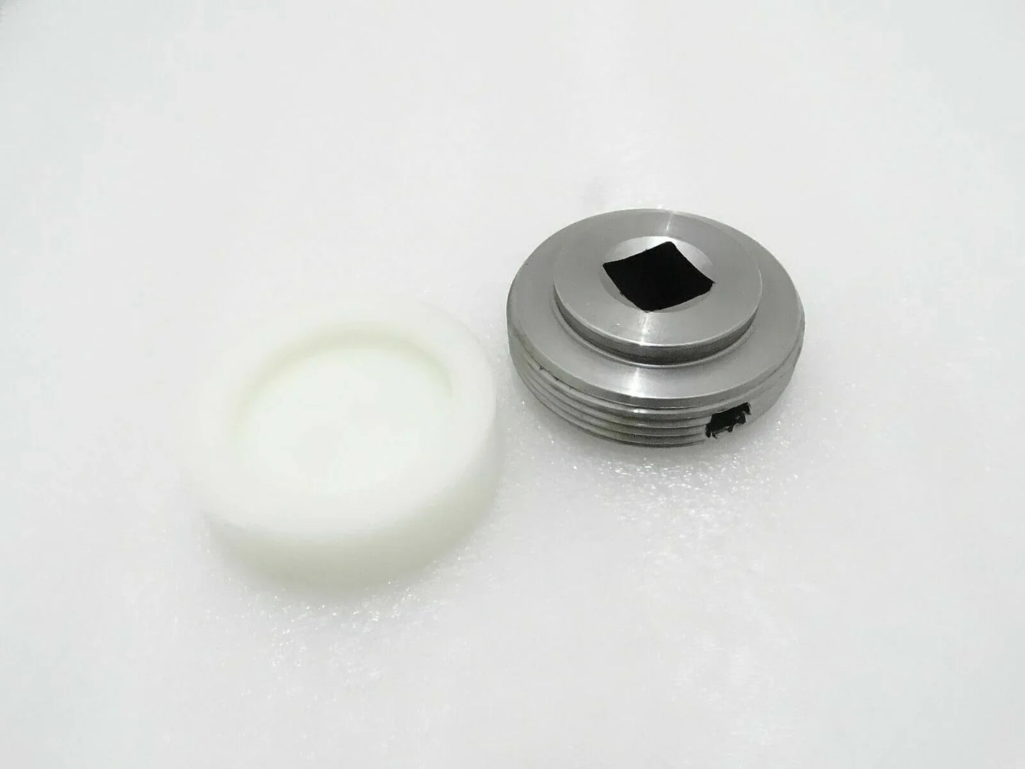 Metal wear pad stabiliser with threaded circular body and black hex socket