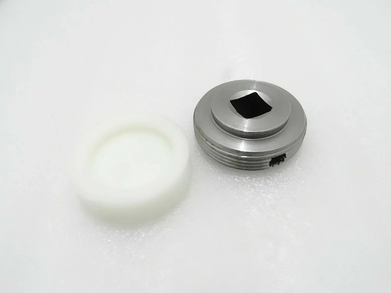 Metal wear pad stabiliser with threaded circular body and black hex socket