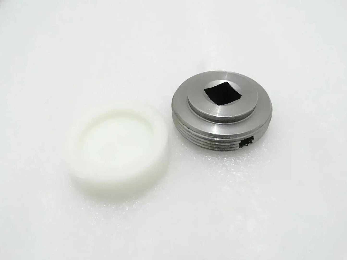 Metal wear pad stabiliser with threaded circular body and black hex socket