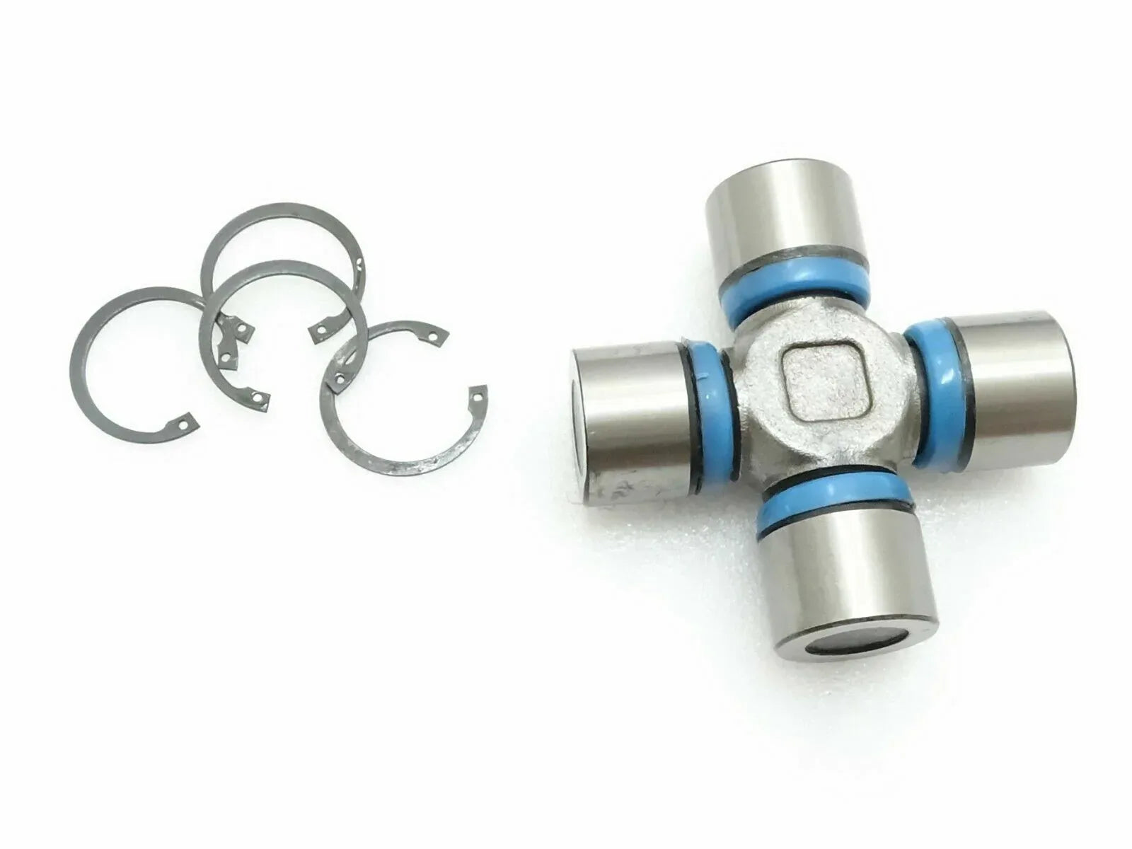 Universal joint kit with metal cross and blue retaining rings, includes circlips