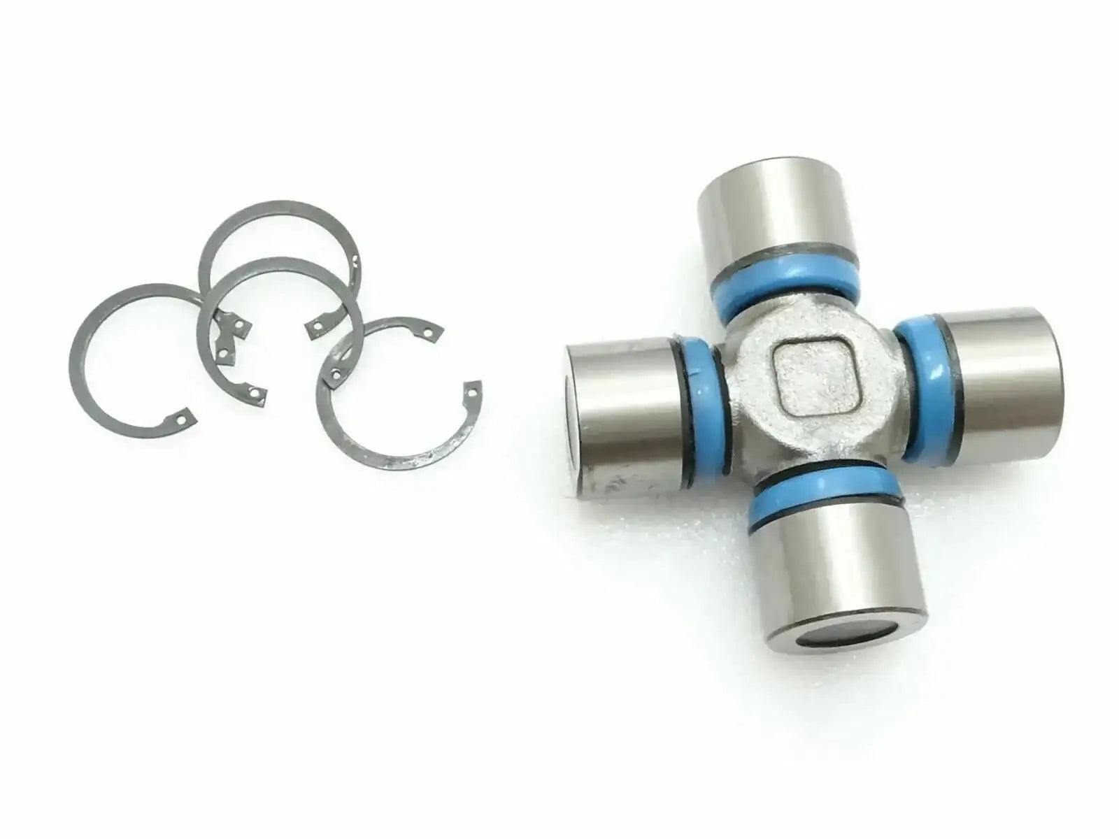 Universal joint kit with metal cross and blue retaining rings, includes circlips
