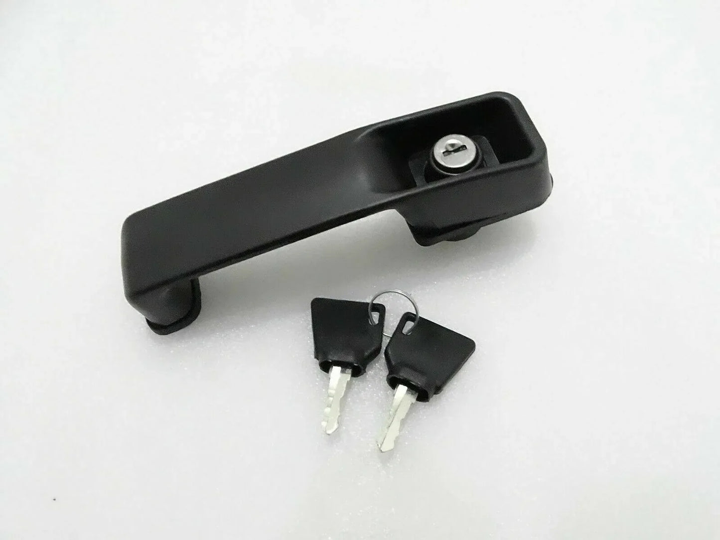 JCB 3DX 3CX door lock handle in black plastic with two accompanying keys for secure locking
