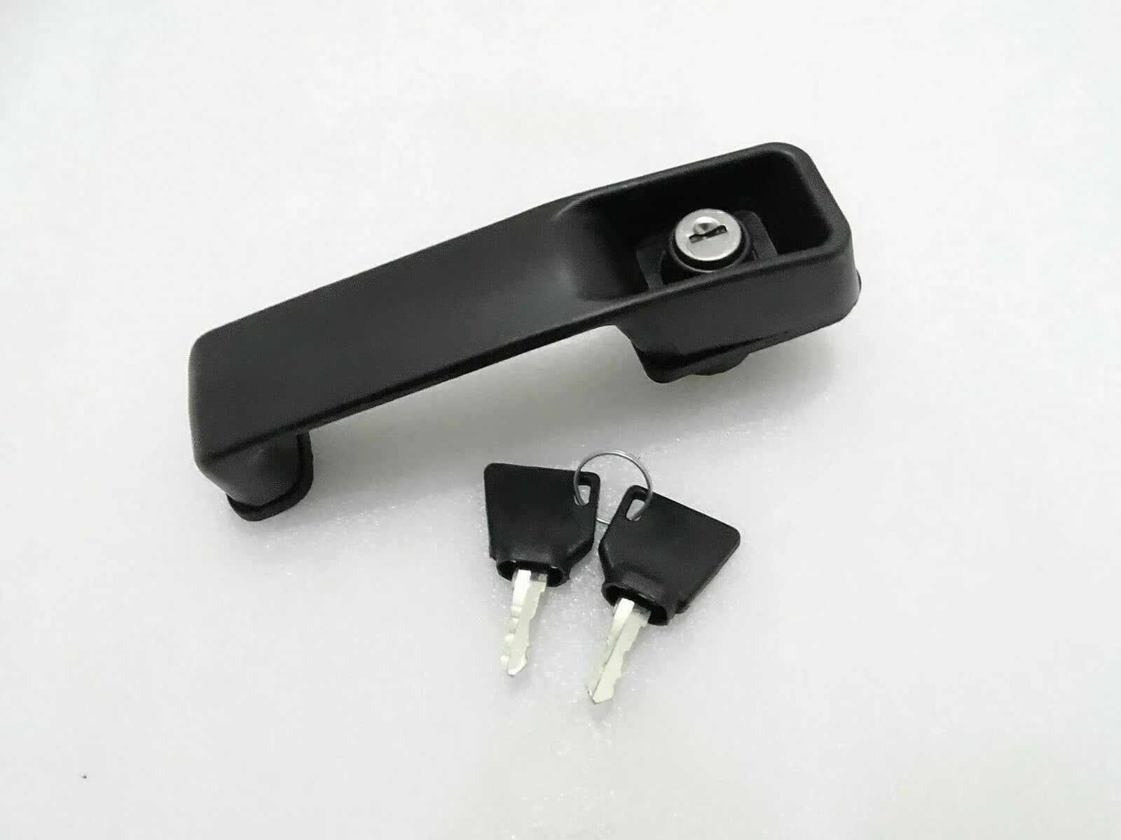 JCB 3DX 3CX door lock handle in black plastic with two accompanying keys for secure locking