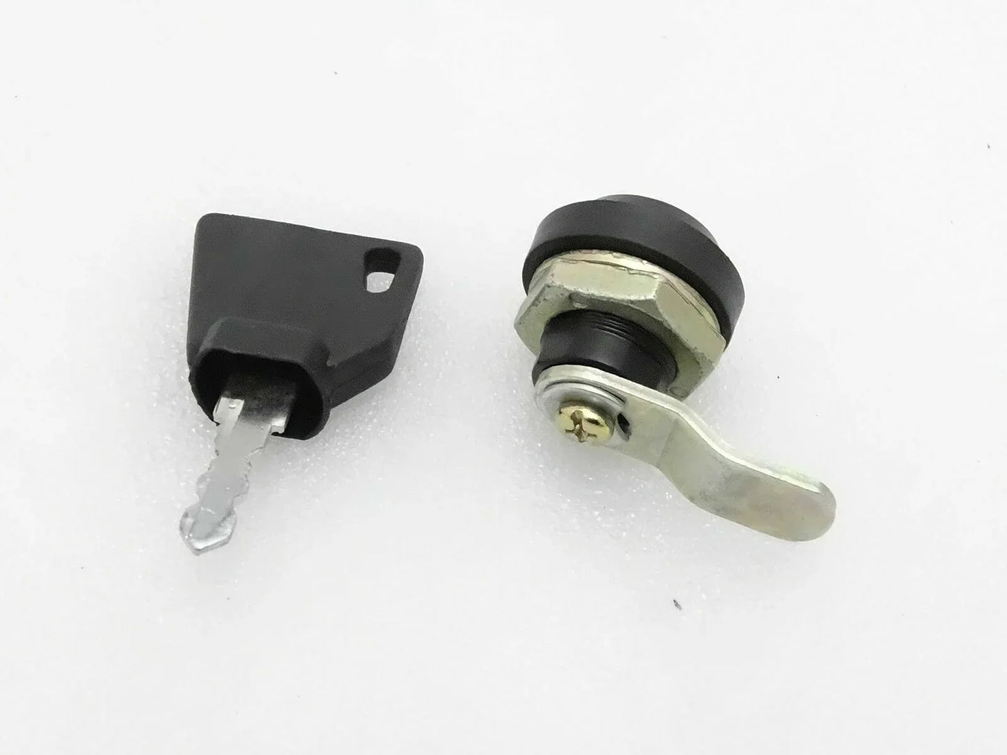 JCB 3DX hood lock with key, made from durable metal with a robust handle for secure use.
