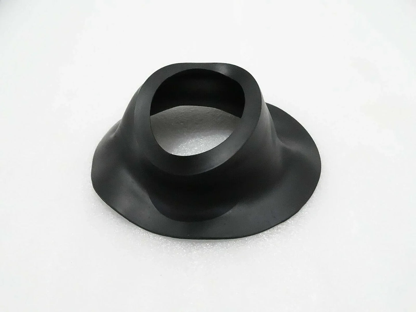 Rubber seal with flared base and circular opening, dark black