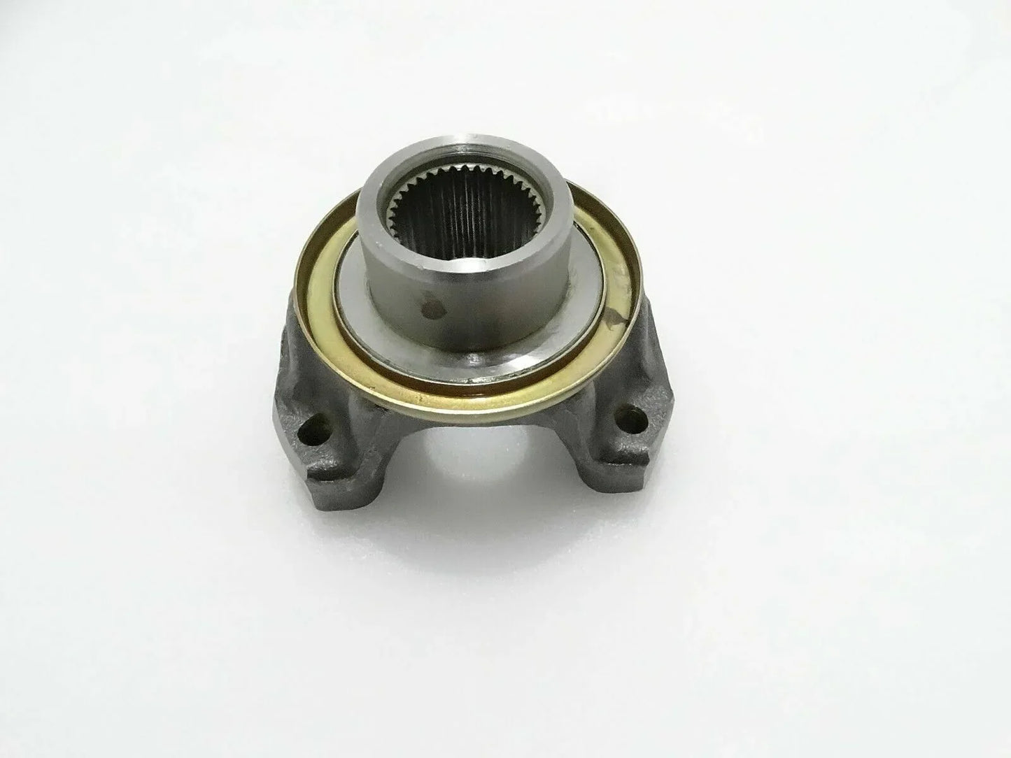 Metal flange yoke bearing with splined inner bore and mounting tabs