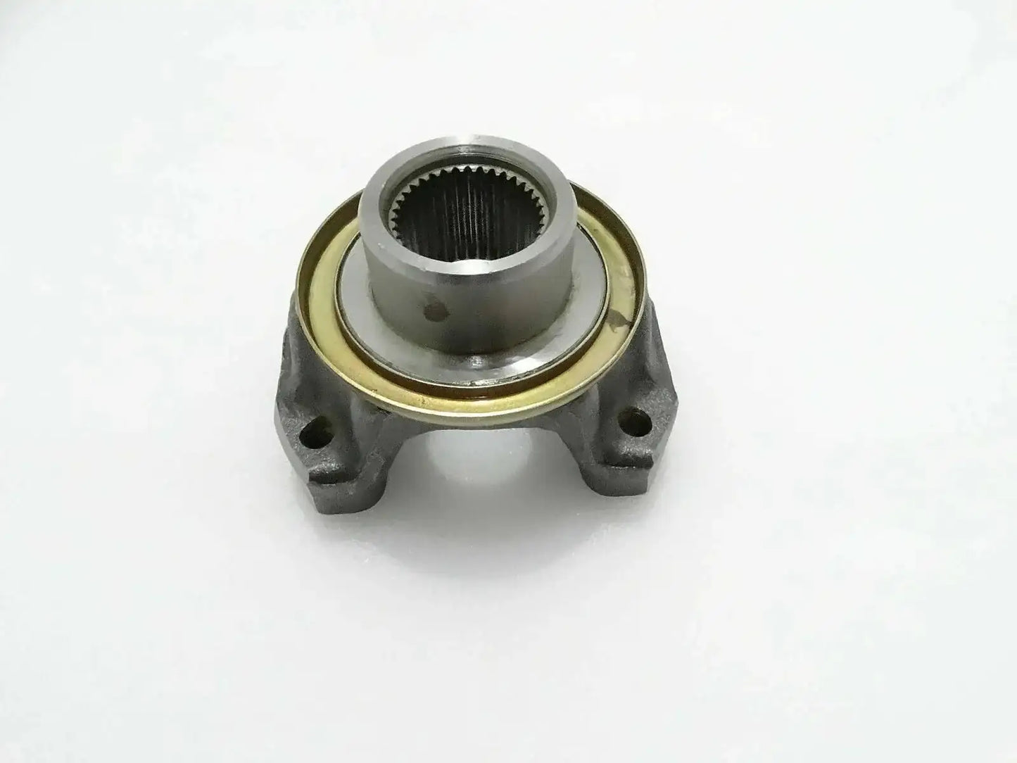 Metal flange yoke bearing with splined inner bore and mounting tabs