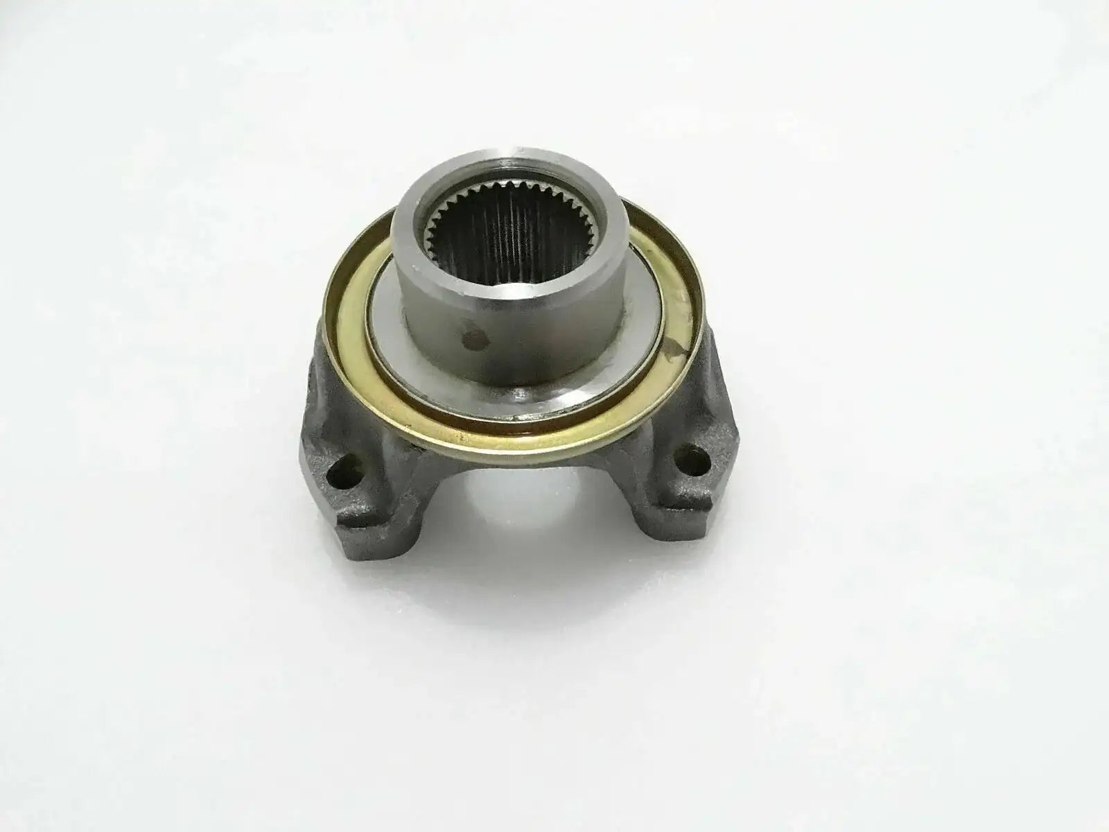 Metal flange yoke bearing with splined inner bore and mounting tabs