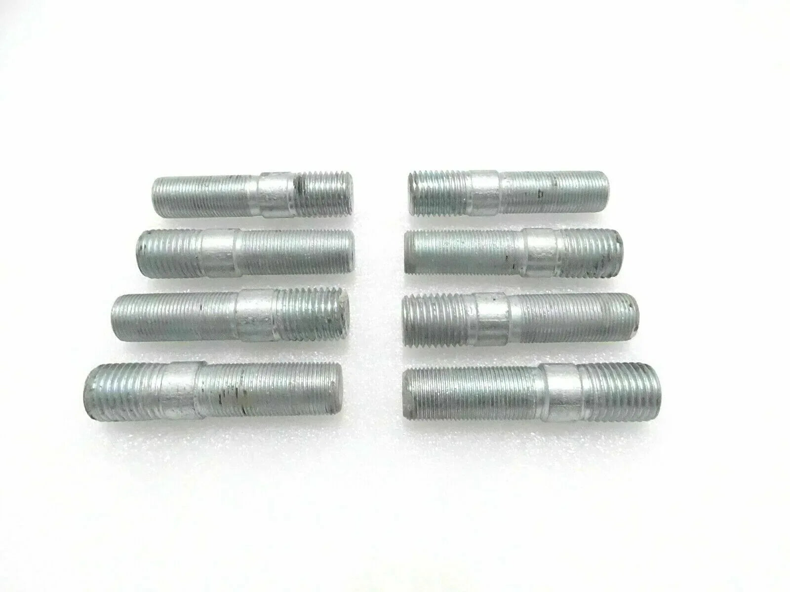 Set of JCB backhoe loader exhaust manifold studs, steel, threaded design for durable engine installation