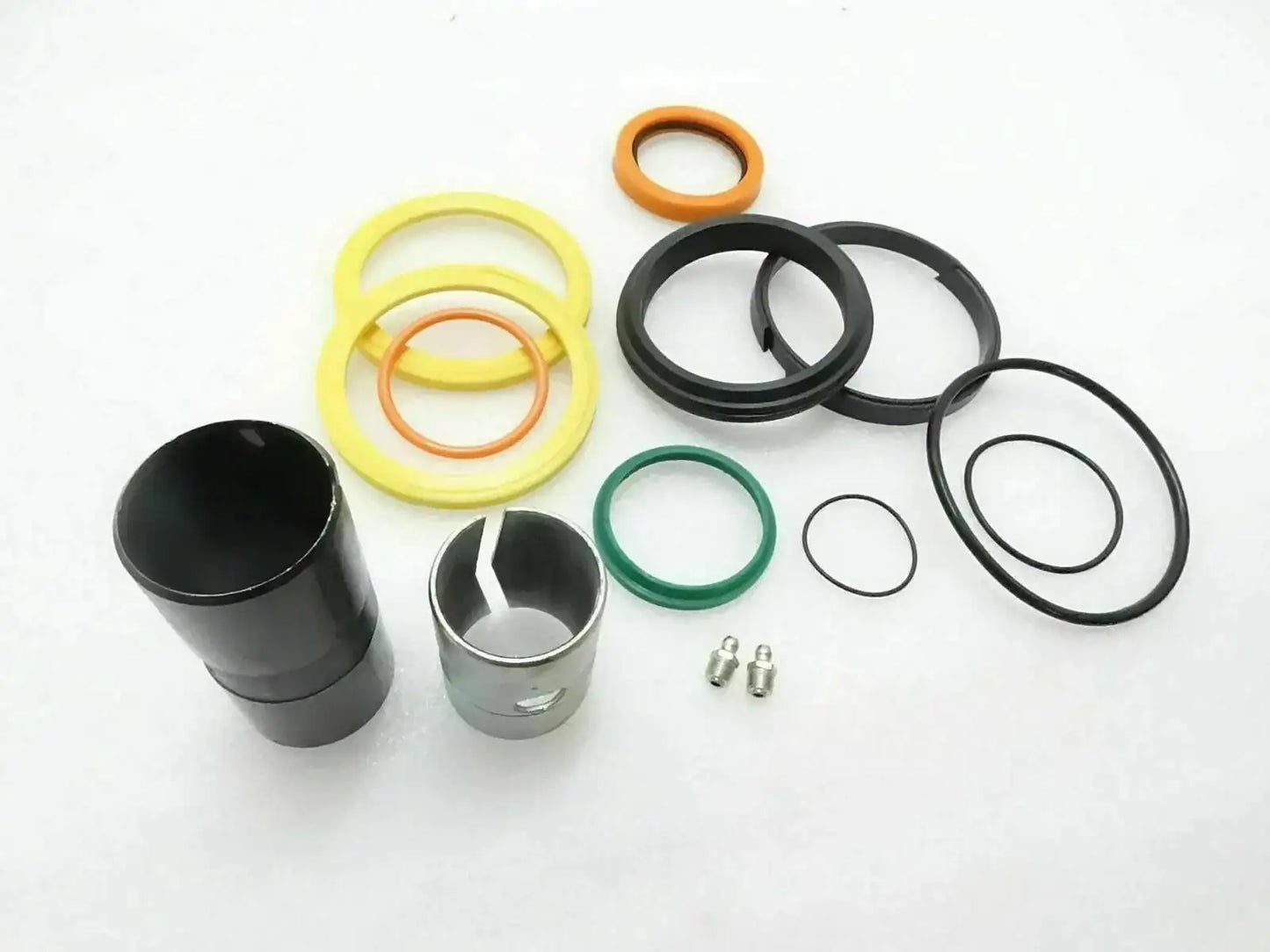 Hydraulic boom ram repair kit with seal rings, O-rings, and metal pins