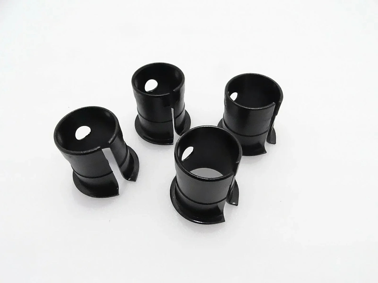 JCB bucket bush replacement, 4-piece set, durable steel, designed for heavy machinery use