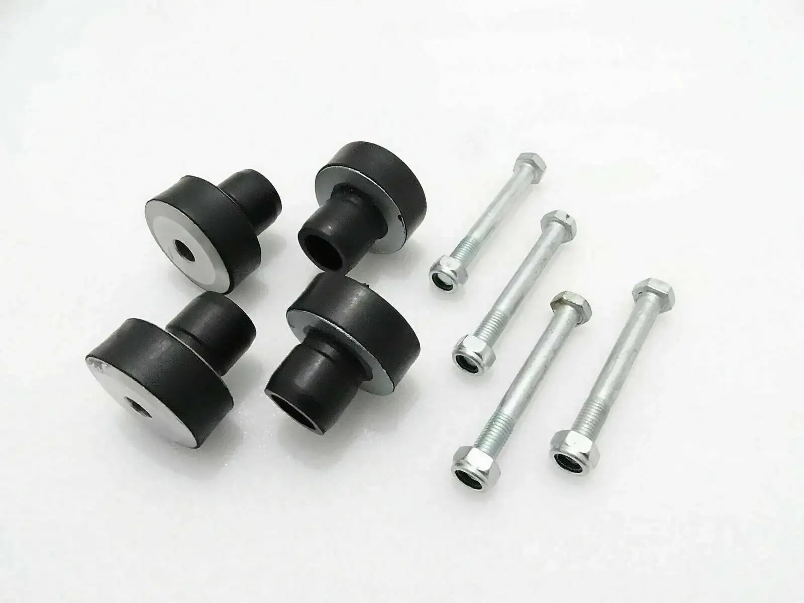 Engine mount bushing set with black rubber mounts and silver bolts, 4 pieces