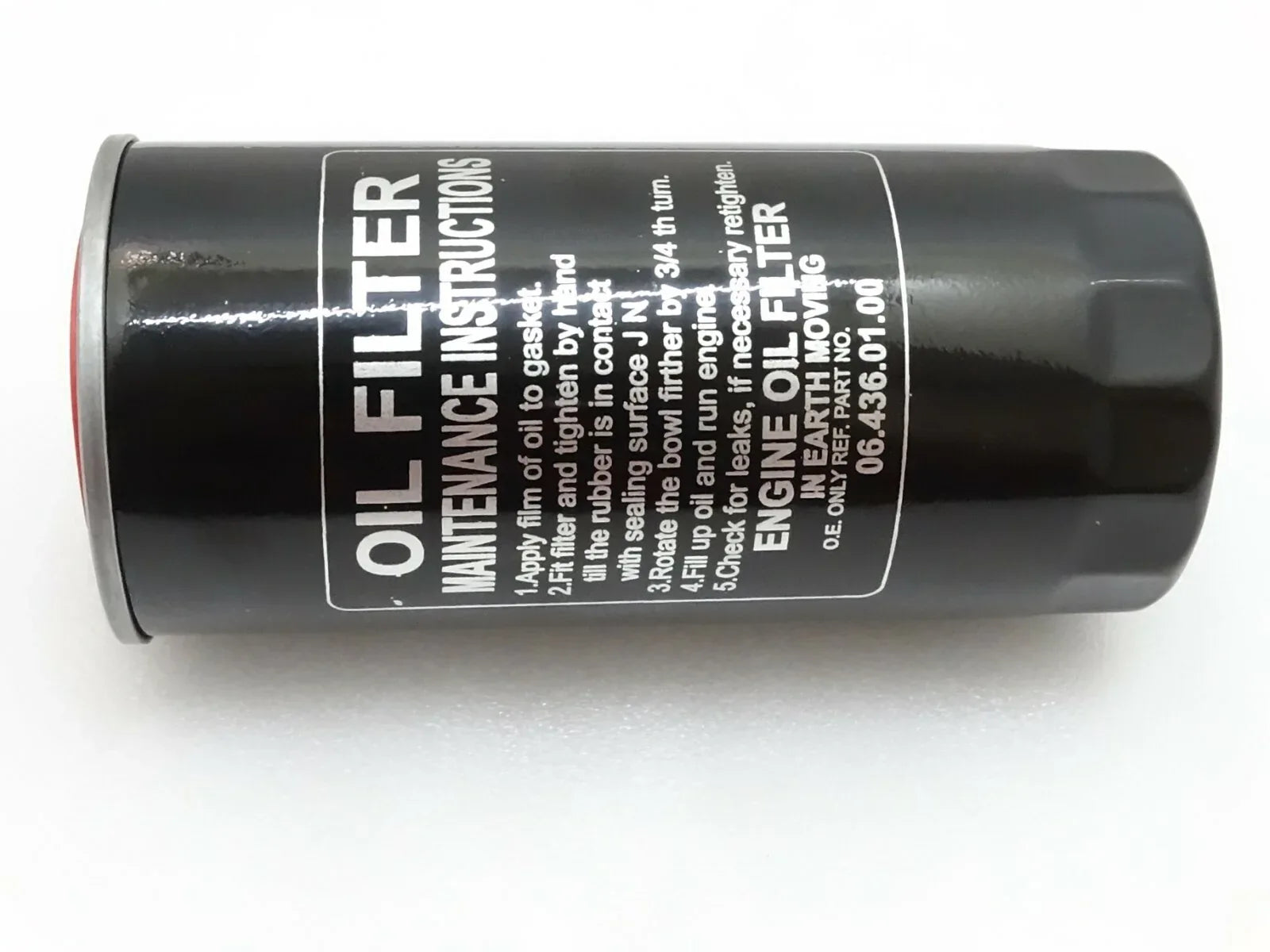 Black cylindrical engine oil filter with printed label