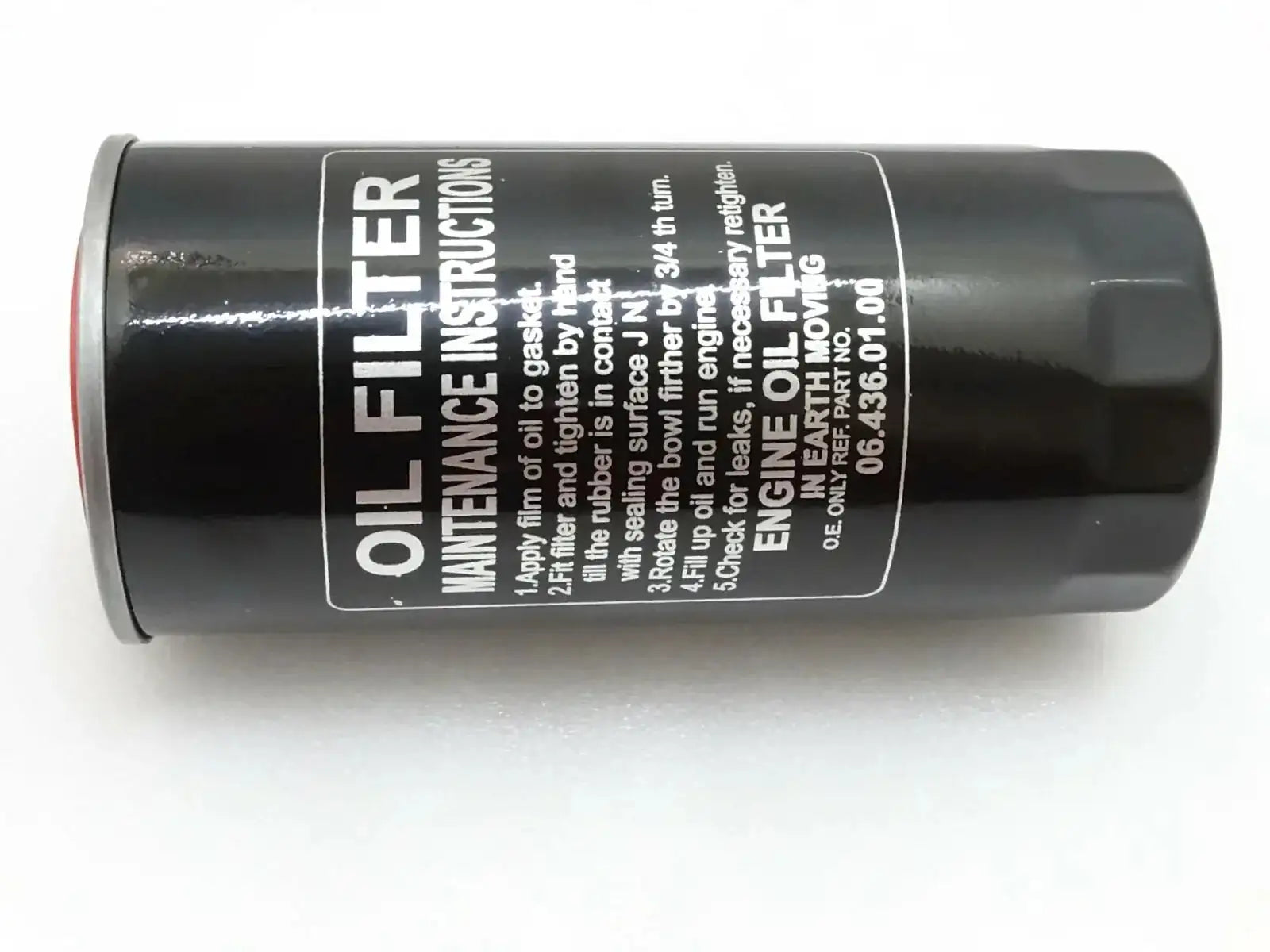 Black cylindrical engine oil filter with printed label