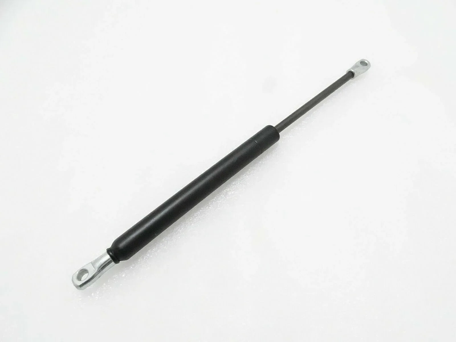 JCB gas strut 120/92806 replacement, durable metal and rubber, for lifting machinery components
