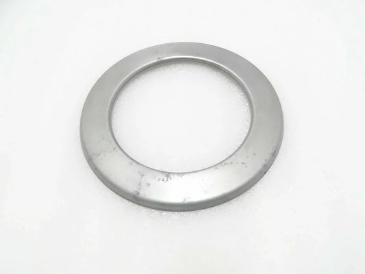 Circular metal hub seal cover with central opening, round flange