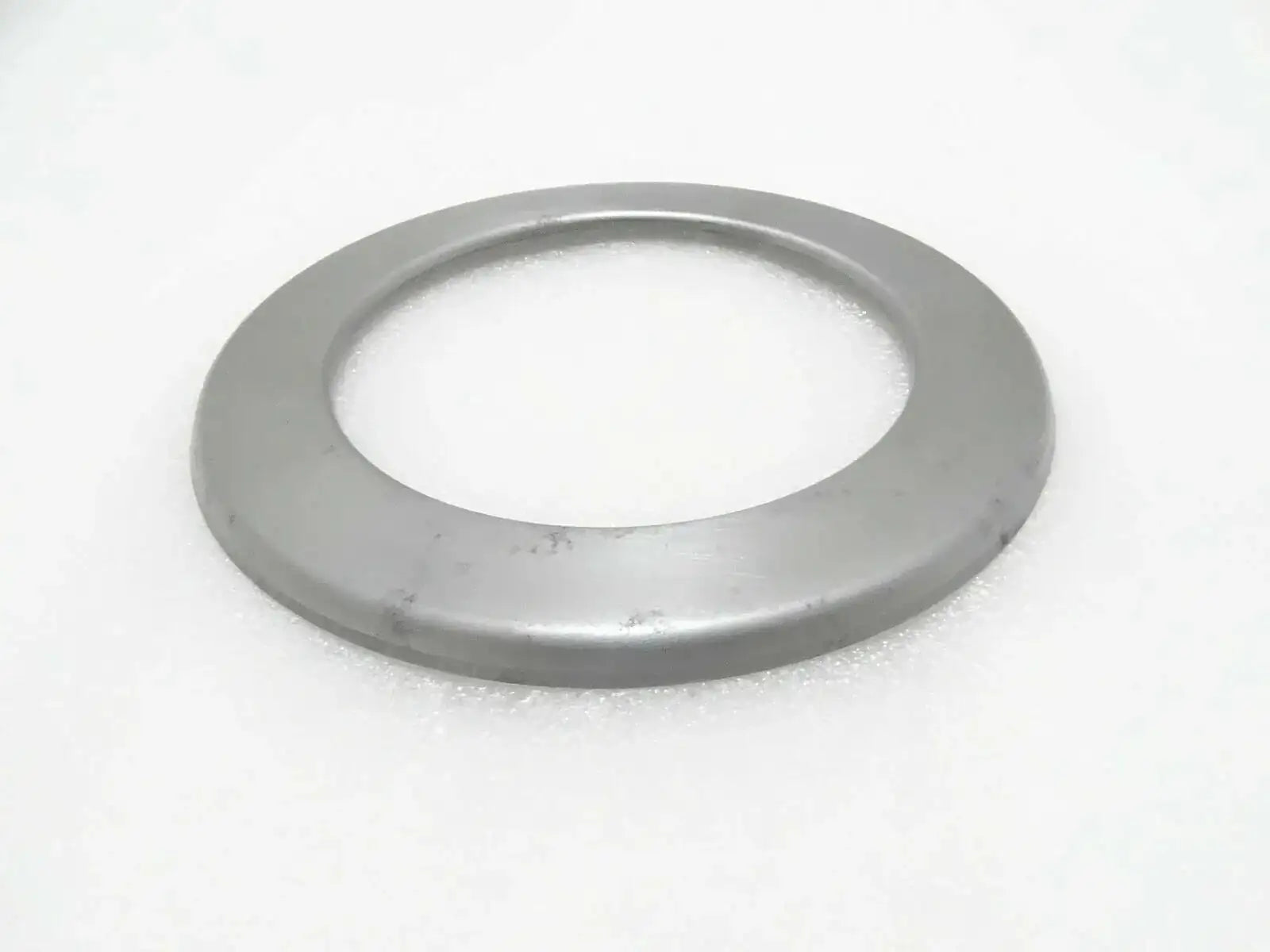 Gray metal hub seal cover ring with center hole, part 458/20403