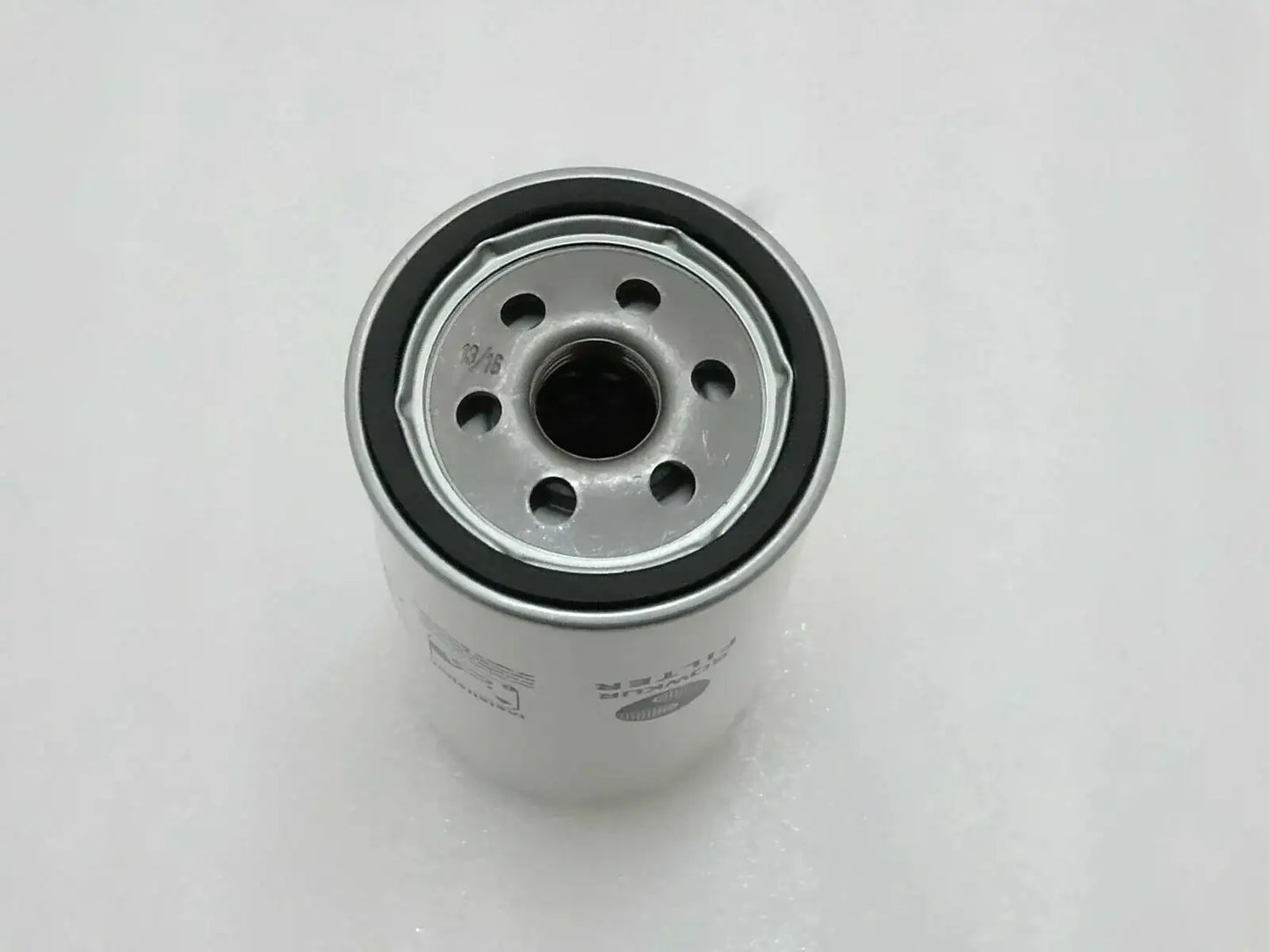 Hydraulic filter cartridge with metal end cap and center black seal